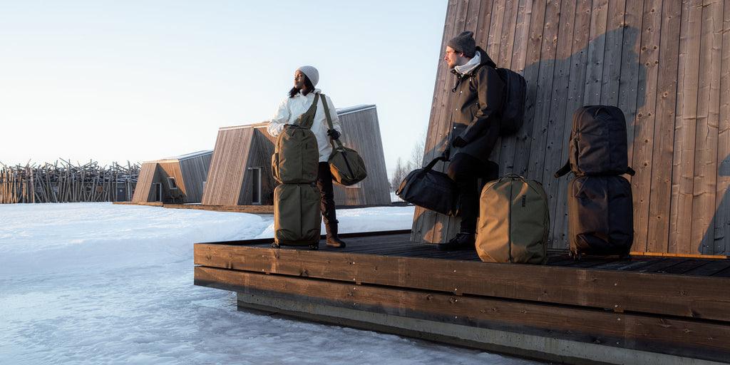 women carrying thule bags